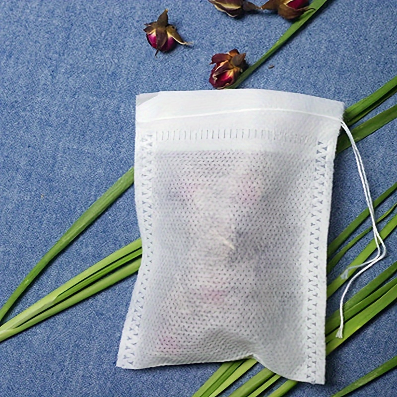 100pcs   disposable tea bags non woven transparent spice filter bags with drawstring ideal for loose leaf tea and spices details 5