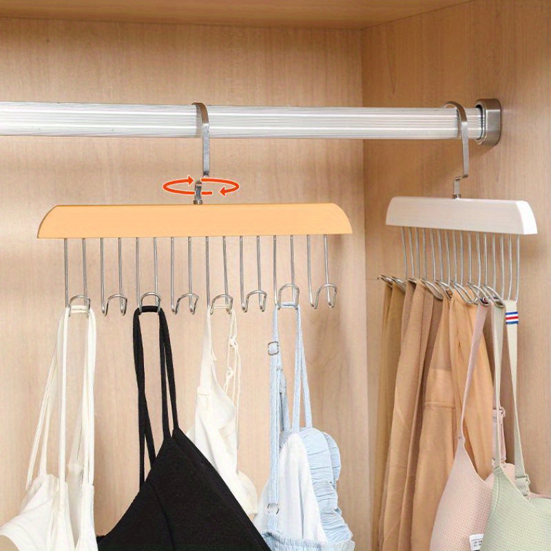 Multifunctional outlet coat hanger