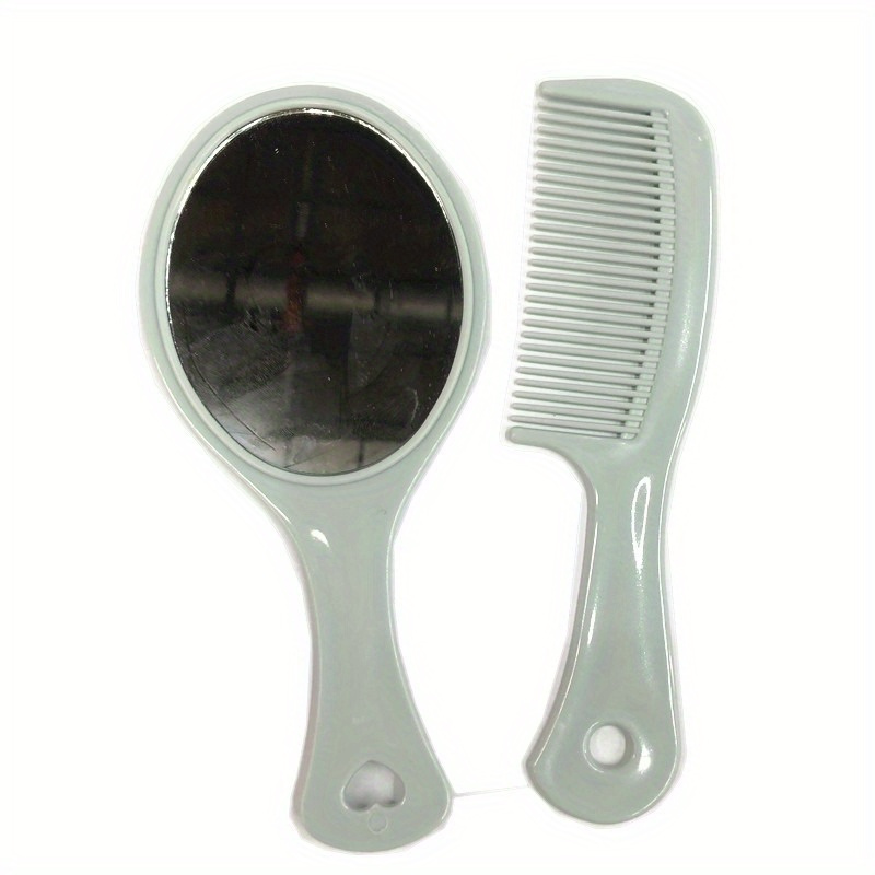 Cepillo de bolsilo para el pelo de viaje gris con espejo