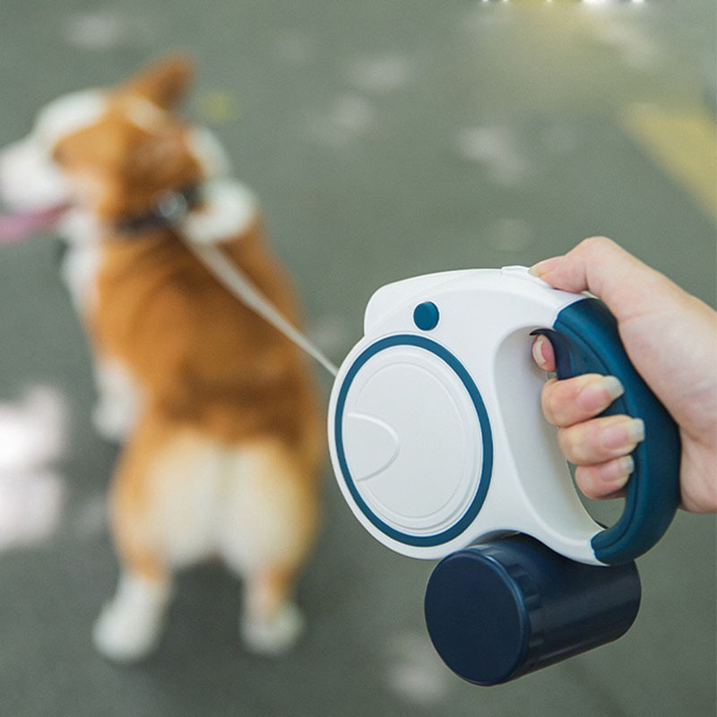 Retractable dog leash hot sale with bag dispenser