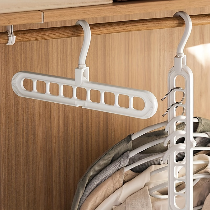 Magic folding outlet hanger