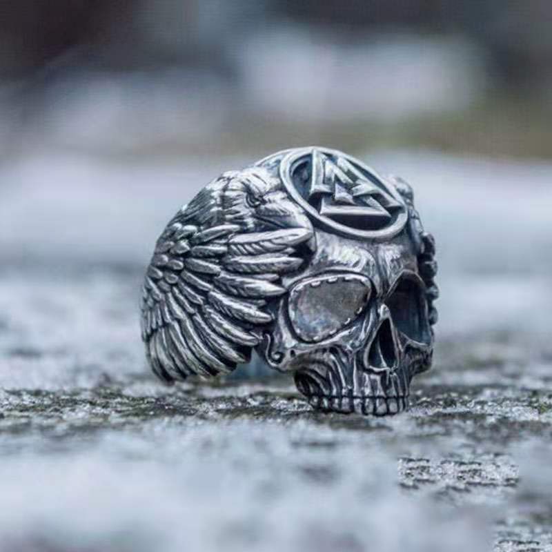 Crow on sale skull ring