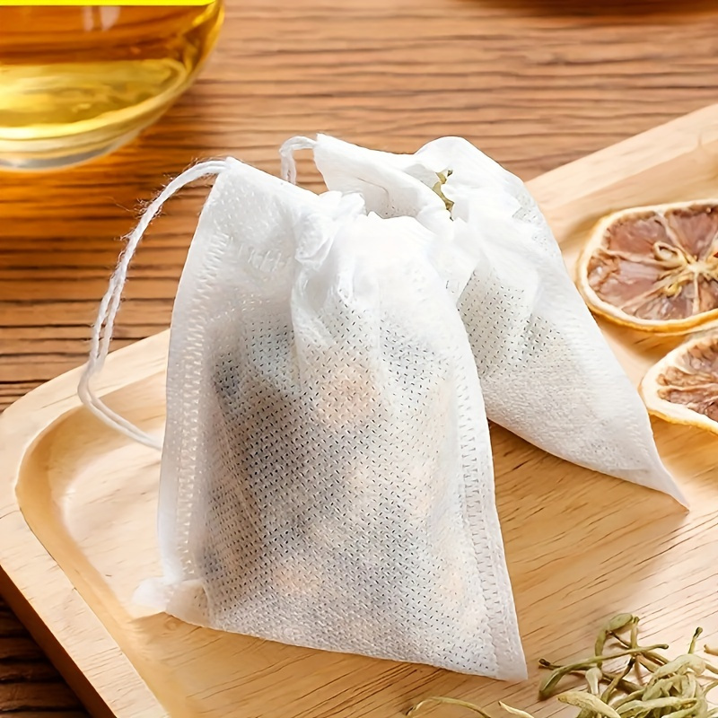 300PCS Tea Filter Bags, Disposable Paper Tea Bag with Drawstring Safe  Strong Penetration Unbleached Paper for Loose Leaf Tea and Coffee（6x8CM）