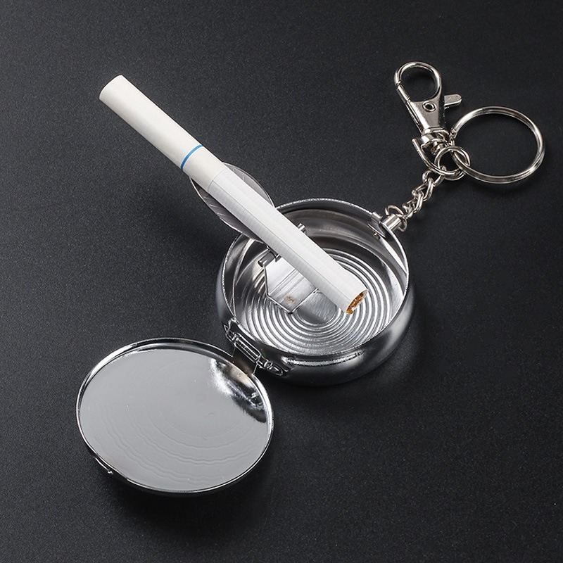 Mini cenicero portátil de bolsillo de metal a prueba de olores cenicero de  cigarrillos de bolsillo con llavero para viajes y uso al aire libre
