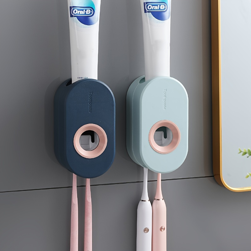 2 dispensadores automáticos de pasta de dientes montados en la pared,  vienen con 2 soportes para cepillos de dientes eléctricos, con cubierta a  prueba