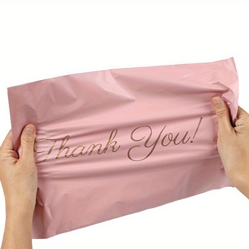 Pink plastic 2024 gift bags