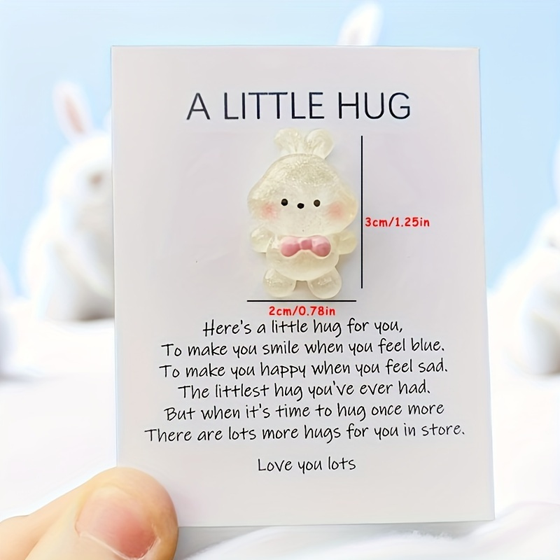 Un piccolo orso tascabile abbraccio che ti invia un abbraccio