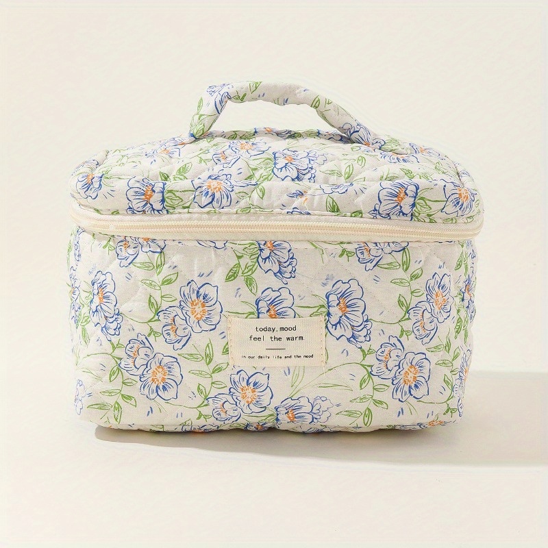 A Spacious Makeup Bag With A Striped Polka , Made From Portable Featuring Adorable Flowers, Perfect For Travel And Instagram