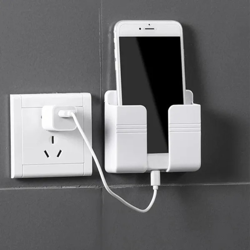 Soporte de pared adhesivo para cargador de teléfono móvil, bolsillo para  enchufe, caja de almacenamiento, soporte de control remoto para teléfono