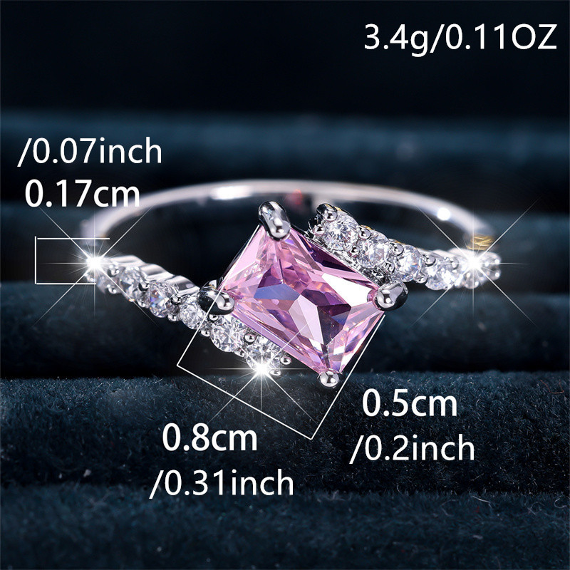Pink Zirconia Engagement Ring with Golden Tone Band