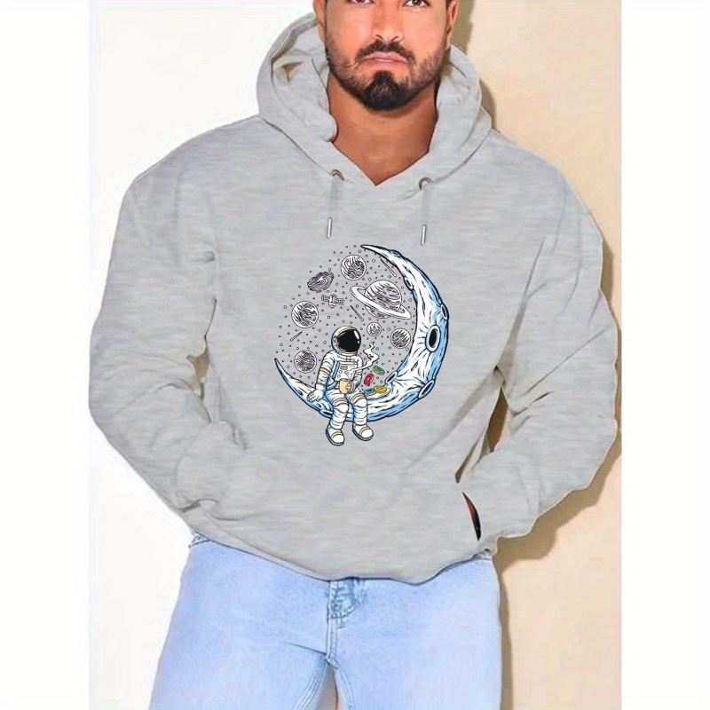 

Plus Size Spaceman On The Moon Print Hoodie, Men's Casual Graphic Design Pullover Hooded Sweatshirt With Kangaroo Pocket Streetwear For Winter Fall, Men's Clothing