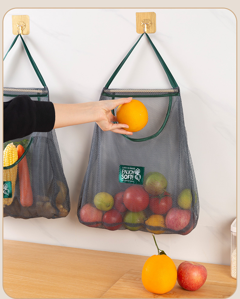 1  storage bag household vegetable and fruit net bag wall mounted ginger and garlic storage net details 0