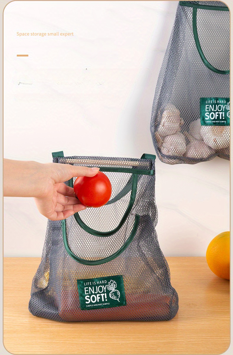 1  storage bag household vegetable and fruit net bag wall mounted ginger and garlic storage net details 2