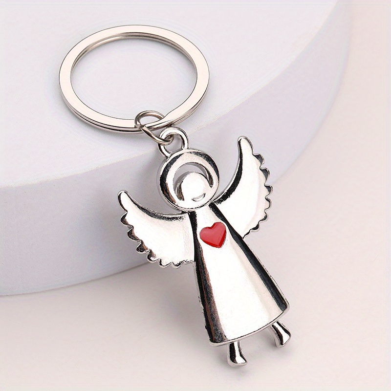 

Creative Metal Keychain With The Wings Of A Saint For Men, Small Gift