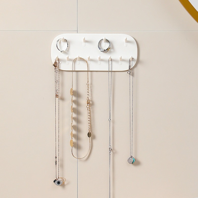  Organizador de joyas montado en la pared, soporte giratorio  para joyas, colgador para guardar y mostrar los collares, pulseras y  pendientes : Ropa, Zapatos y Joyería