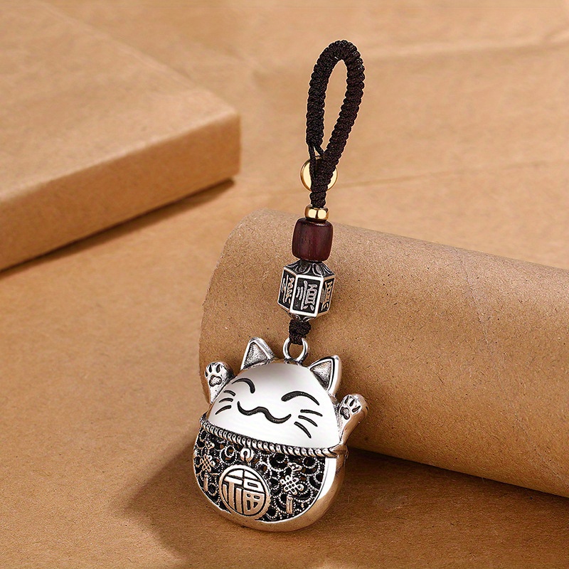 Key Accessories For Men And Women, With A Simple Ethnic Style, Featuring A Chinese-style Lucky Cat And Copper Coins For Attracting Wealth, As Well As A Cartoon Cat Pendant For Women. details 2