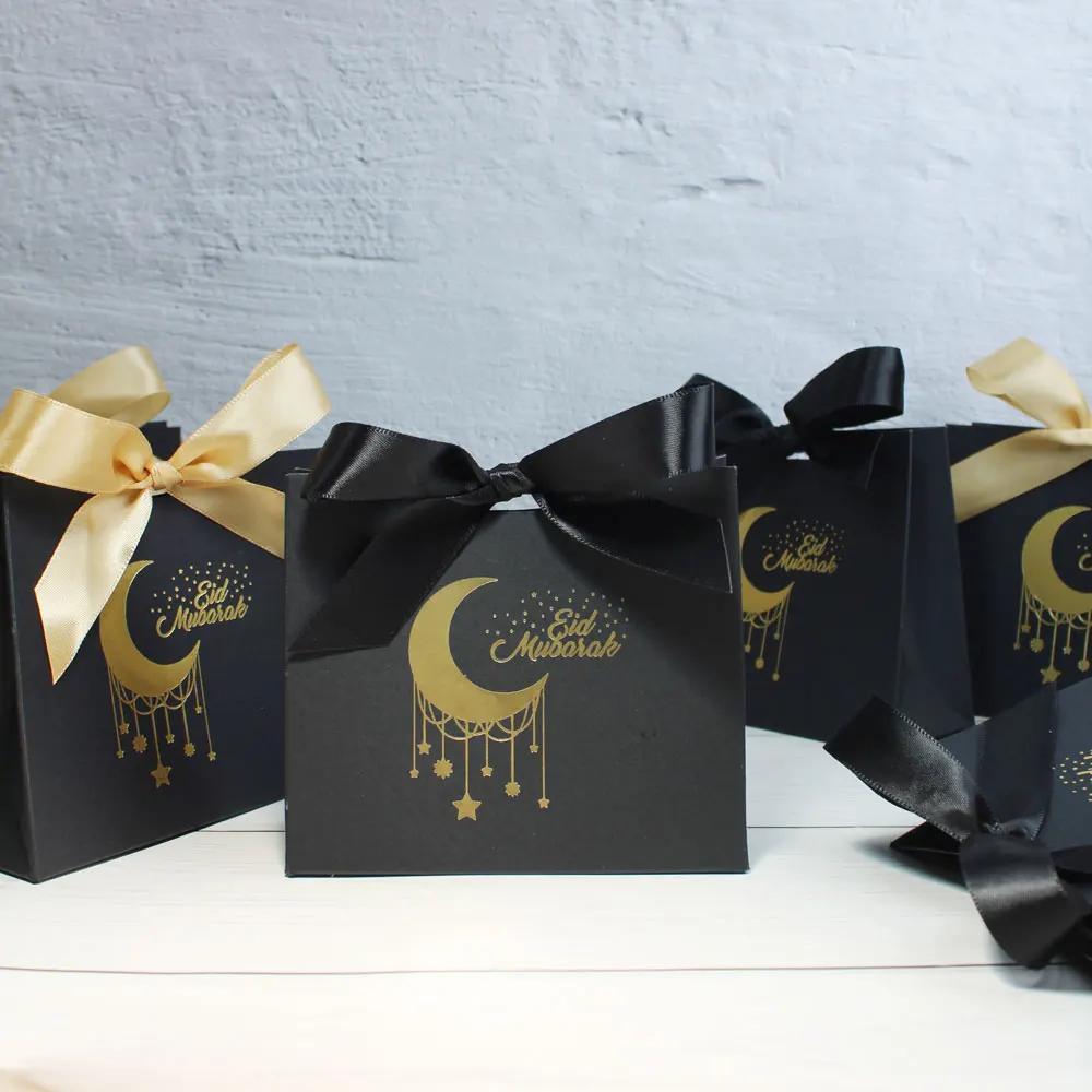 

Boîte de bonbons Eid Mubarak élégante en noir, idéale pour les faveurs de fête lors du Ramadan Kareem, pour célébrer le festival musulman.