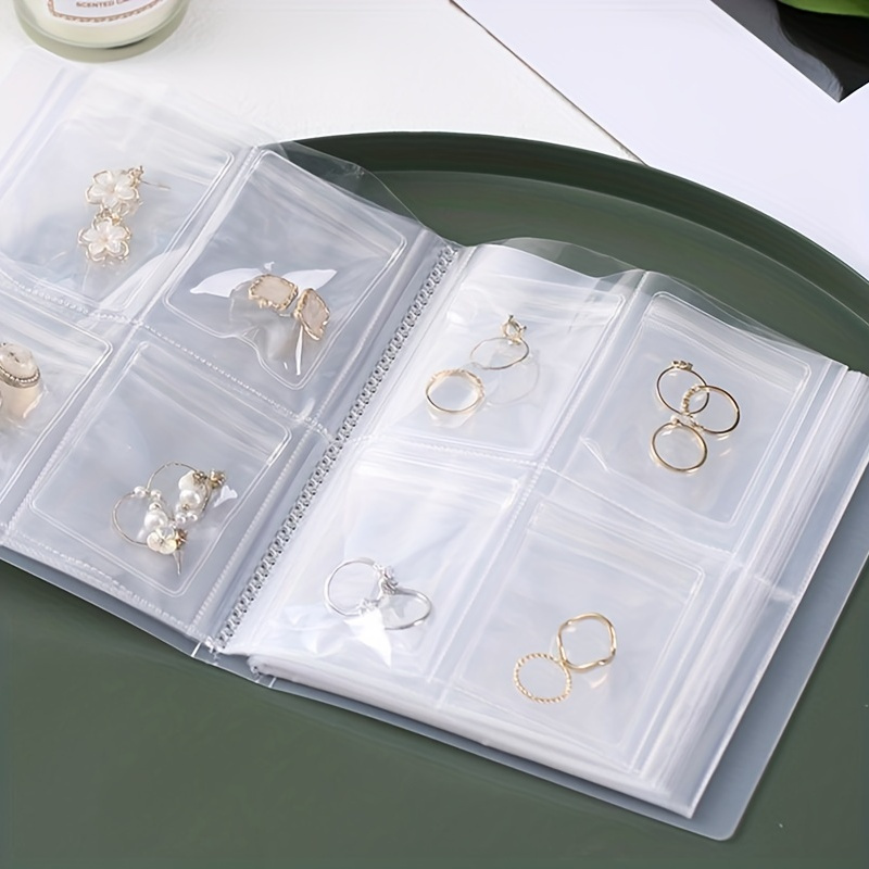 

1pc Plastic Jewelry Storage Album, Portable Jewelry Earrings Storage Book, Anti Oxidation Jewelry Organizer, Transparent Dustproof Storage Jewelry Book, Sealed Bag