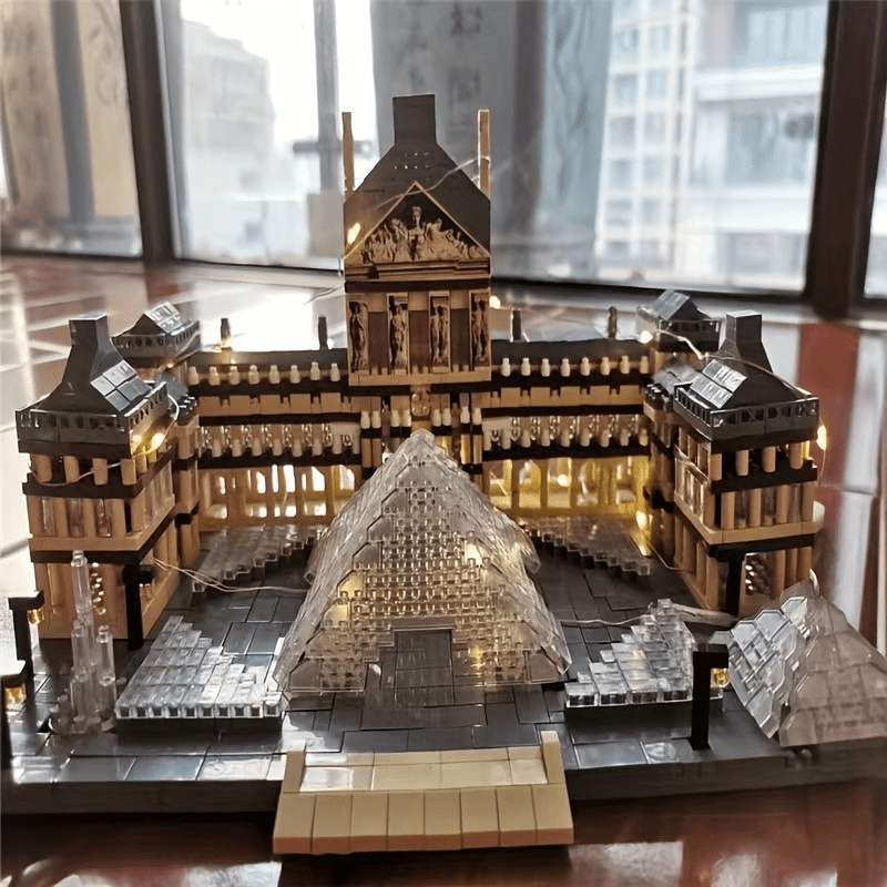 

3377 pièces de particules miniatures assemblent des blocs de construction du Louvre, un paysage emblématique du monde, cadeau d' et de Noël.