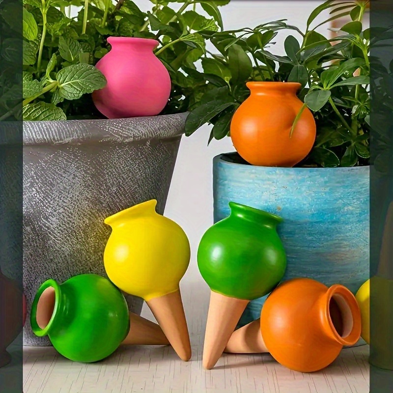 

Set Of 4 Small Terracotta Plant Watering Globes For Indoor And Outdoor Plants, Perfect For Keeping Plants Hydrated While You're Away (random Color)