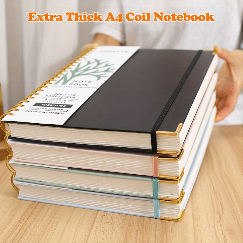 

A4 Coil Notebook With Extra Thick 110gsm Paper, 300 Pages, Available In 4 Colors, Featuring Built-in Storage Pouch For Superior Comfort. Also Known As Coil Notebook, Spiral Notebook, Wirebound Journal