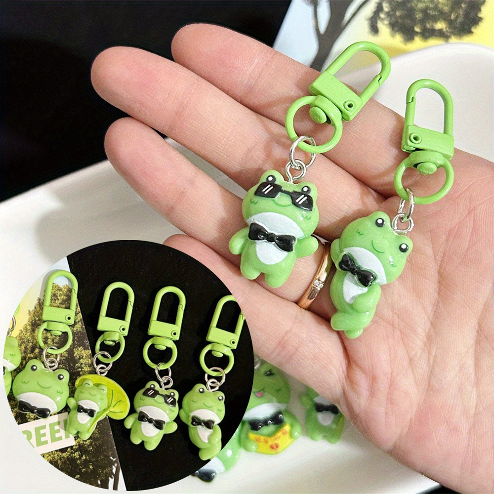 

2pcs Creative Frog Keychain For Men, Pocket Hug Popular Lonely Frog Keychain For Men, Cute Fun Mini Cartoon Pendant Keychain, Holiday Gift