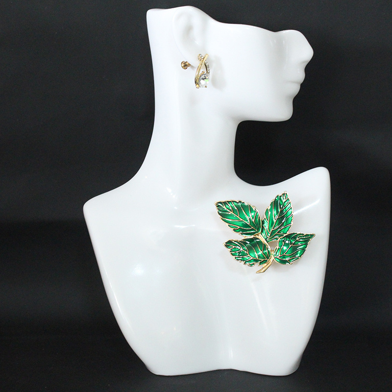 elegant vintage inspired brooch with green leaves diamond accents   scarves coats sweaters details 0