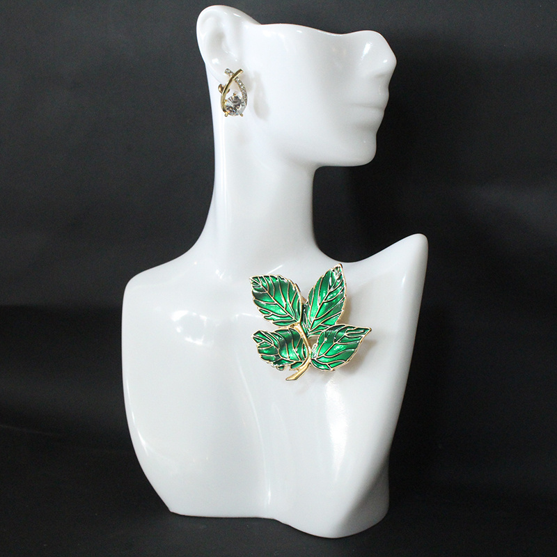 elegant vintage inspired brooch with green leaves diamond accents   scarves coats sweaters details 1