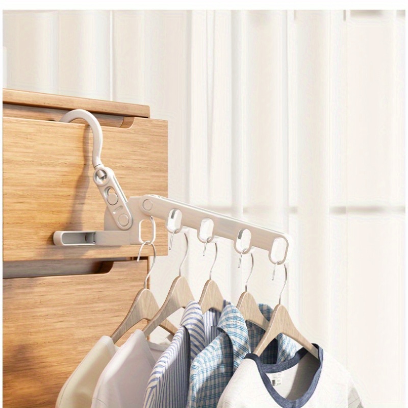 

Portable 5-hole Folding Hanger - Essential Travel Accessory, Durable Plastic, Space-saving Design For Home & Business Trips