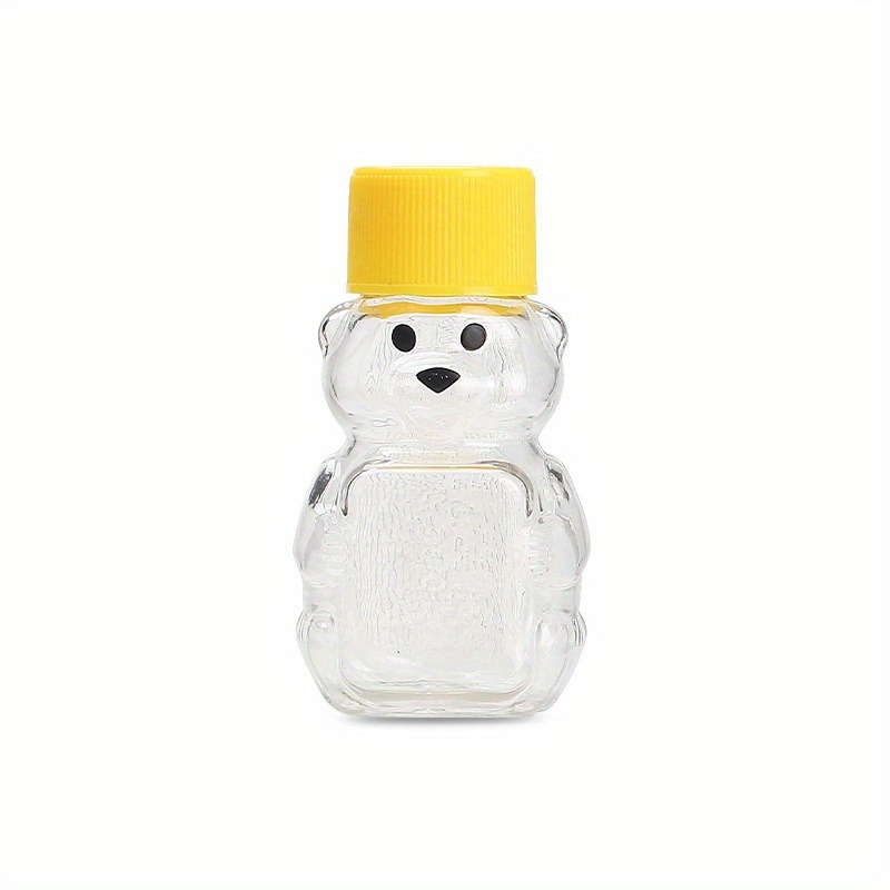 

25pcs, 2 Oz Plastic Bear Jar Bear-shaped Transparent Honey Container, Bulk Non-slip Texture Empty Bear Cup, Reusable Mini Bear Jar With Yellow Lid, Kitchen Supplies