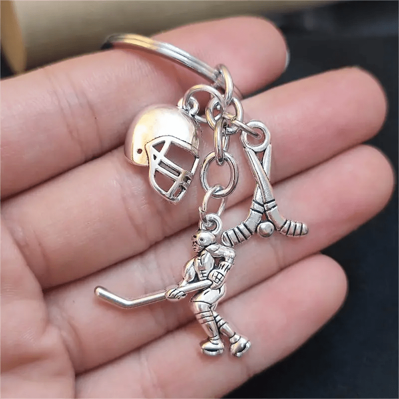 

1pc Sporty Hockey Player Keychain With Helmet & Stick Charms, Sports Durable Metal Pendant Keyring, For Athletes And Fans