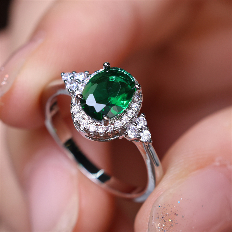 Elegant Oval Cut Green Stone CZ Claw Ring for Special Occasions