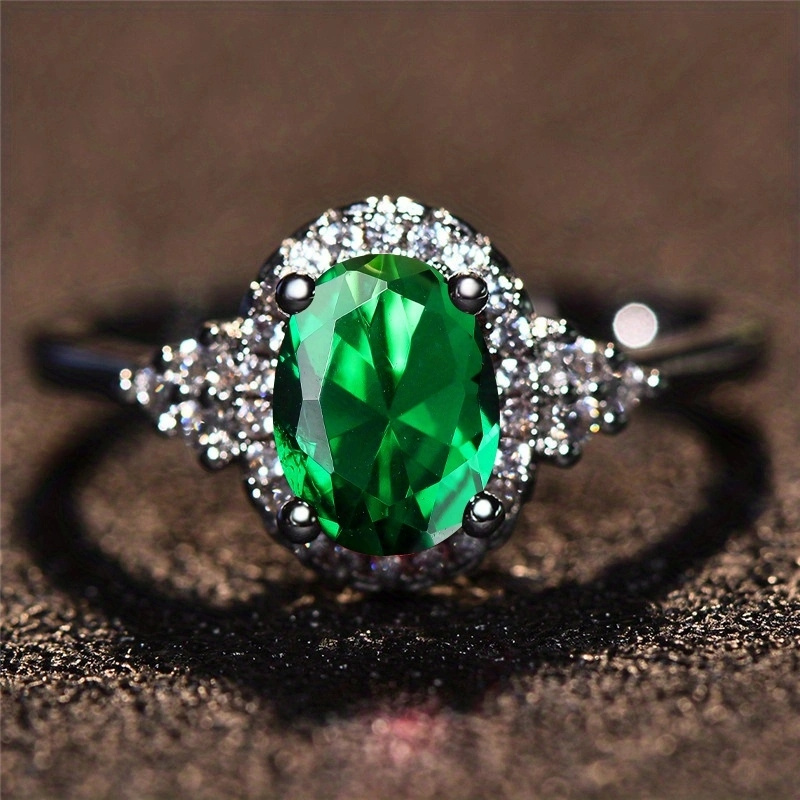 Elegant Oval Cut Green Stone CZ Claw Ring for Special Occasions