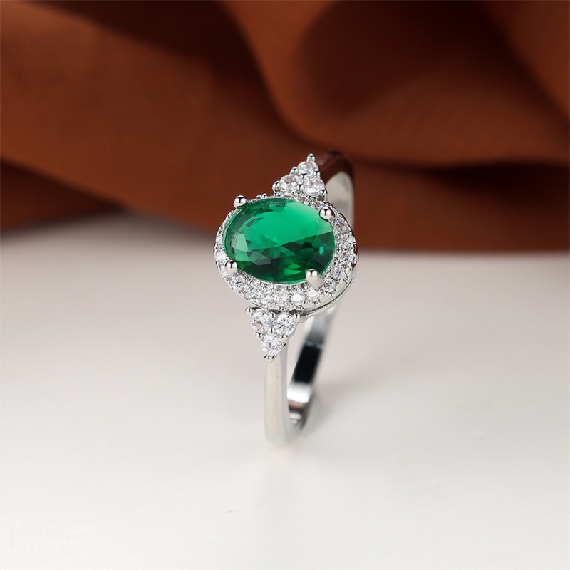 Elegant Oval Cut Green Stone CZ Claw Ring for Special Occasions