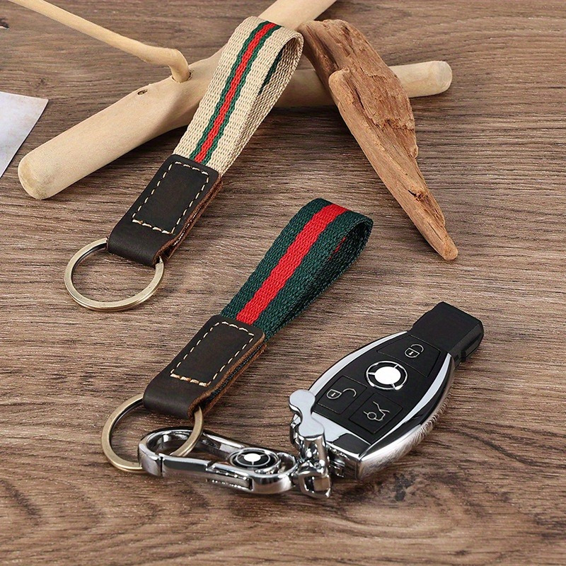 

Trendy Woven Nylon Keychain, Striped Multi-functional Creative Lock Key Pendant, Faux Leather Key Ring Accessory Pendant, Car Key House Key Ring Outdoor Climbing Key Ring