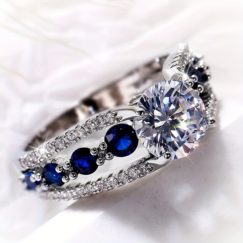 

Stunning Unisex Ring With Brilliant Round Zircon Stone - Perfect Gift For Any Occasion