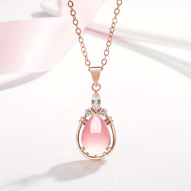

Japanese And Korean Temperamental Necklace Female Drop-shaped Pink Crystal Pendant Simple Niche O-shaped Chain Clavicle Chain Rose Quartz Pendant