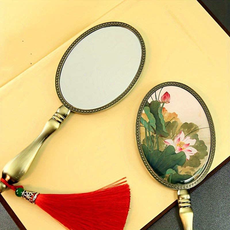 

1pc Vintage Chinese Floral Handheld Makeup Mirror, Polished Metal Frame, Portable Dresser Mount, Unscented Glass Surface, No Electricity Or Battery Needed