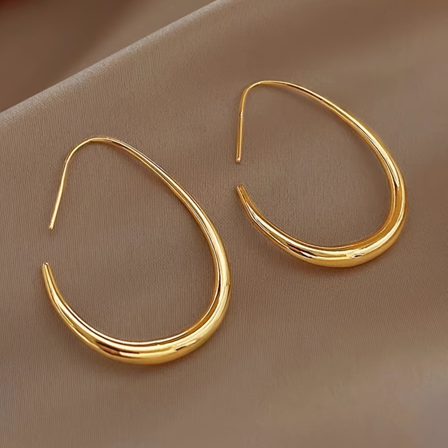 

Chic Golden-tone Alloy Hoop Earrings For Women - Sleek Water Design, Polished , , Novelty Earrings