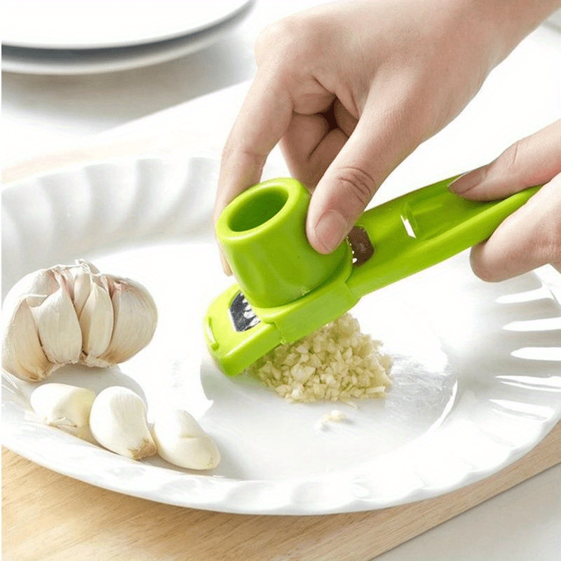 

Stainless Steel Garlic Press And Ginger Cutter - Manual Multi-functional Kitchen Grater Grinder Tool With Durable Plastic Handle - Food Contact Safe