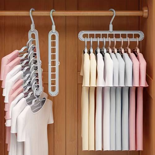 a foldable multi functional plastic hanger with lacquered end saving foldable storage organizer for shirts pants bags and more