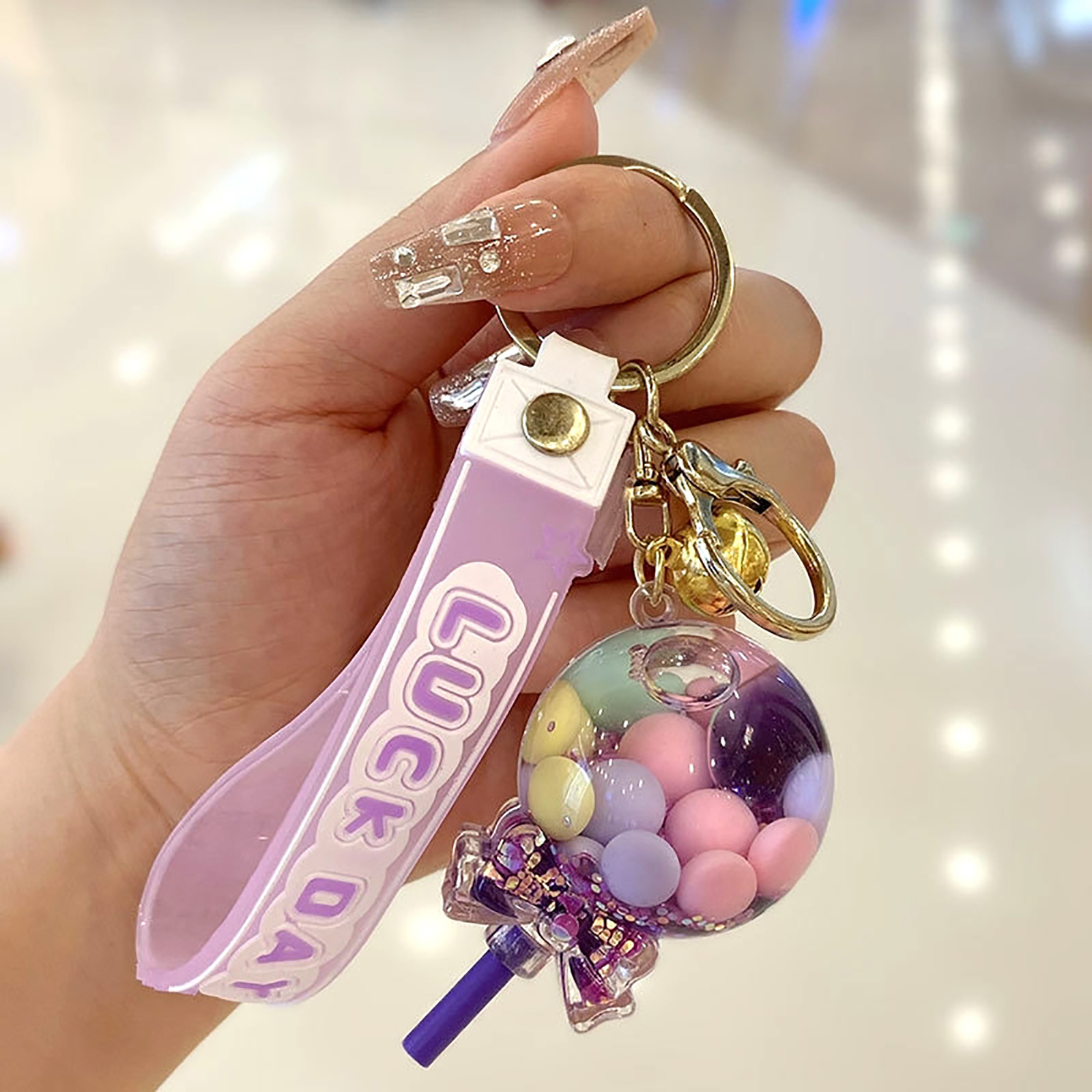 cute cat paw keychain with quicksand floating   lollipop charm 1pc key ring accessory for backpacks and bags details 2