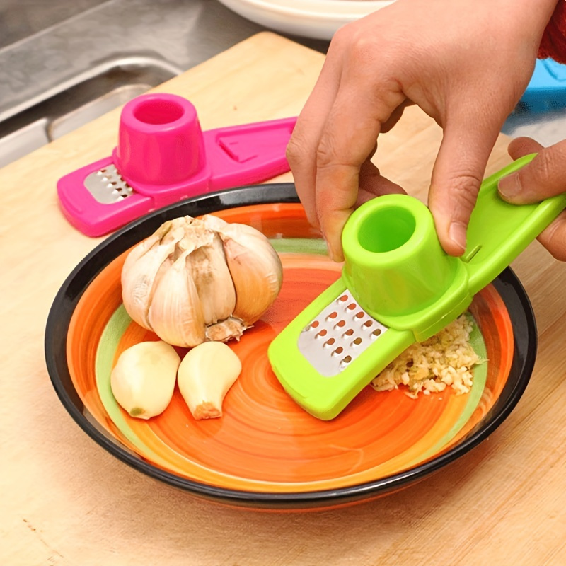 

Multi-functional Garlic Ginger Press - Manual Stainless Steel Kitchen Grater And Grinder With Plastic Handle - Durable Food Contact Safe Kitchen Tool