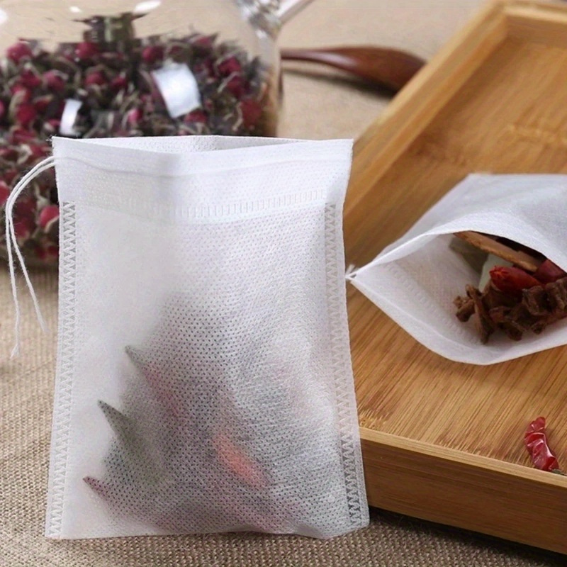 100  non woven fabric tea infusers with drawstring   loose leaf tea coffee herbal soups   disposable tea bags for travel mugs small pots leak proof   ideal for diy scented teas spices kitchen essentials details 0