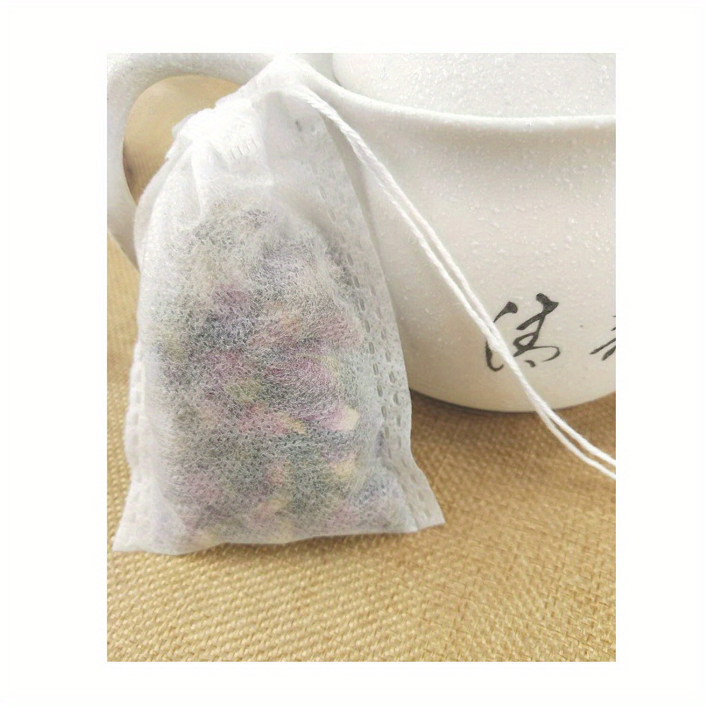 100  non woven fabric tea infusers with drawstring   loose leaf tea coffee herbal soups   disposable tea bags for travel mugs small pots leak proof   ideal for diy scented teas spices kitchen essentials details 12