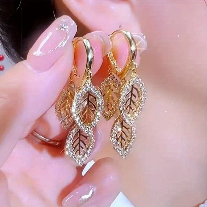 

A Pair Of Delicate Hollow Leaf Designs Sparkle With Rhinestone Pendant Earrings Elegant Bohemian Chic Gift For Women