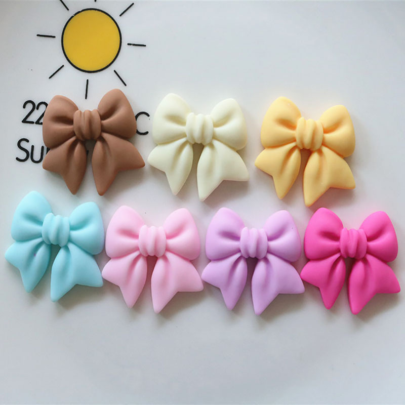 

7pcs Colored Cartoon Bow Ornaments, Suitable For Mobile Phone Cases, Hairpins, Pencil Cases, Keychain Making