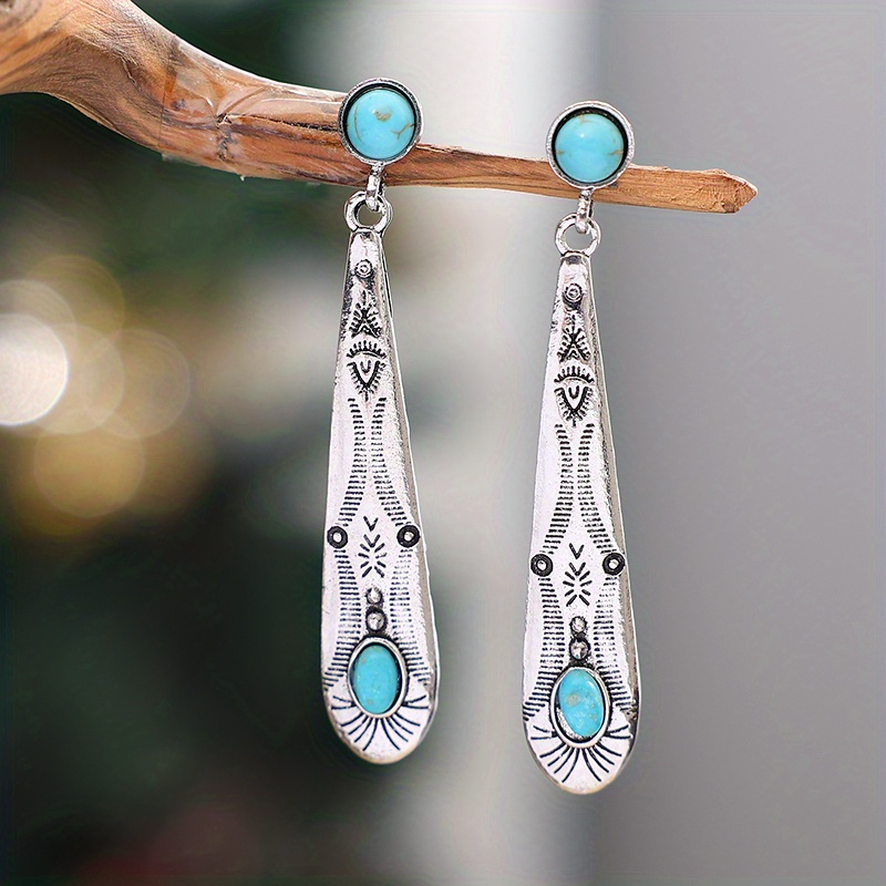 TEMU Retro Ethnic Style Jewelry Featuring Dangle Earrings With A Carved Long Teardrop Shape With Turquoise.