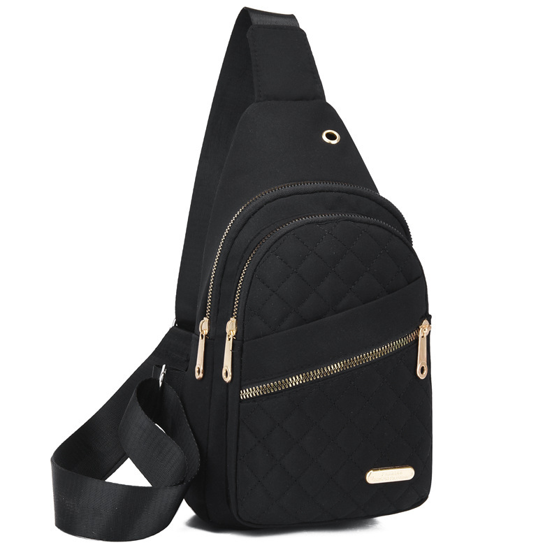 Of A Stylish Women's Crossbody Bag Featuring An Embroidered Diamond Grid Design, Large Capacity, Material, And Hole