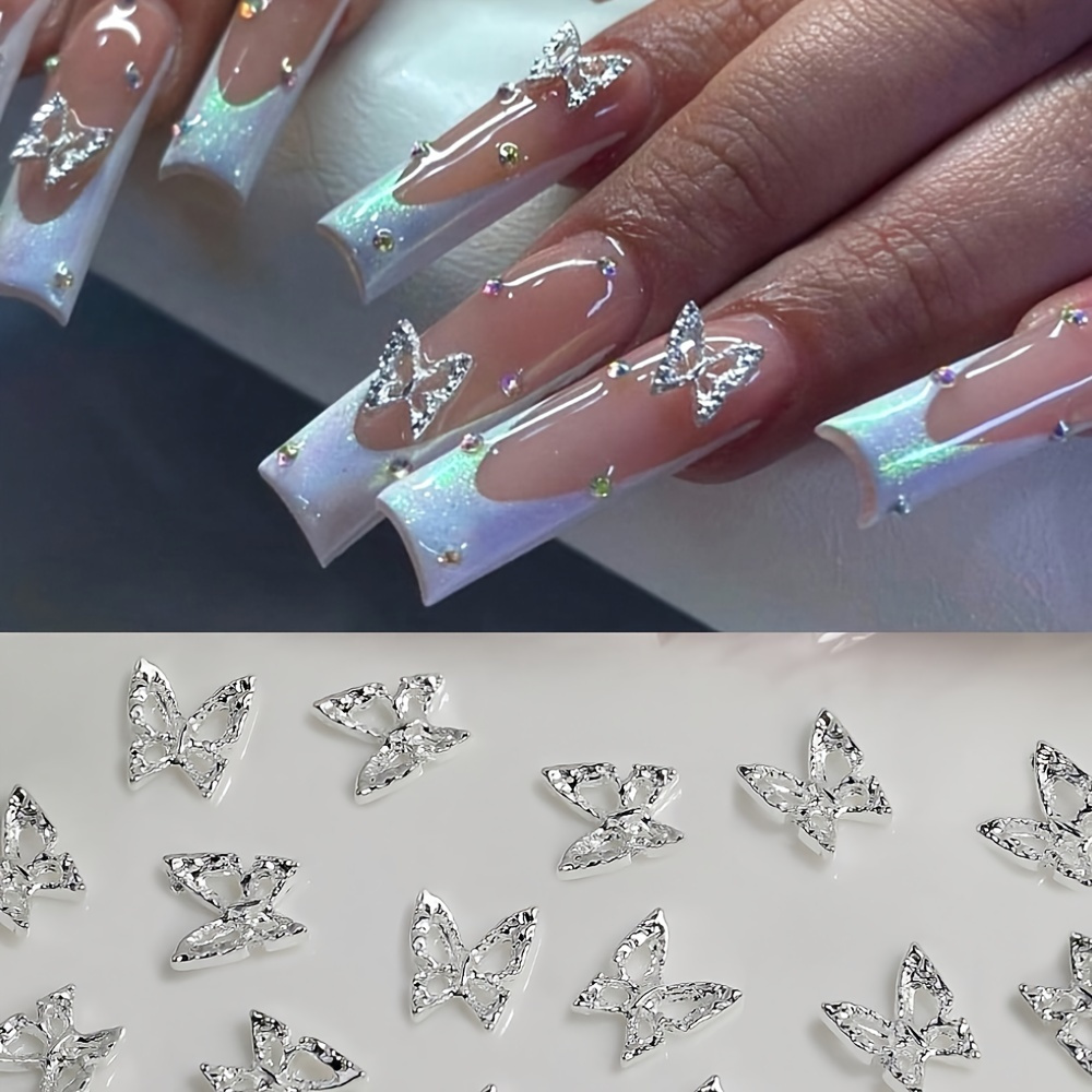 

50pcs Silvery-tone Hollow Butterfly Design Nail Decoration Set, No Fragrance, Trendy Nail Accessories For Women